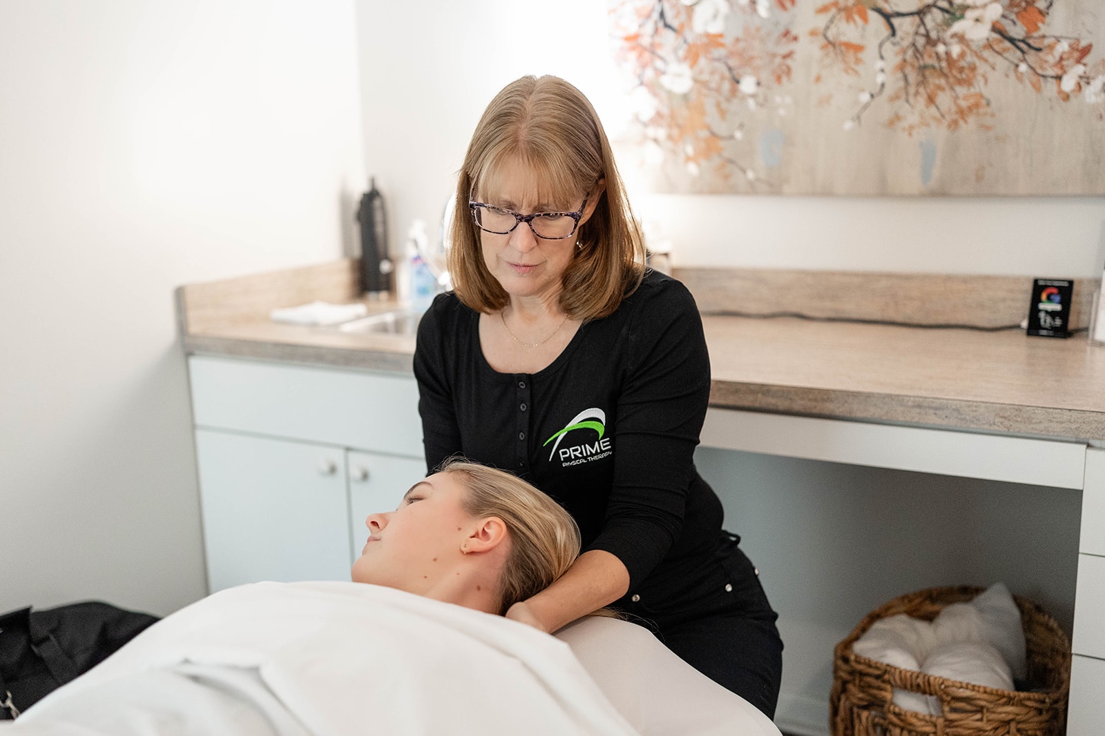 Physical Therapist Dr. Laura Yoo treats a patient in their PRIME Physical Therapy clinic in Eldersburg, Maryland.