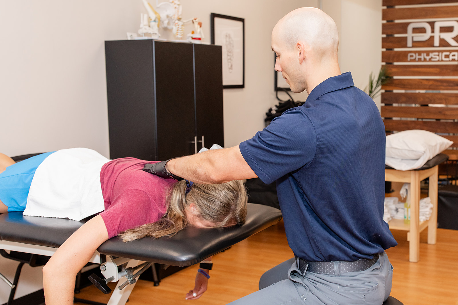 Physical Therapist Dr. Joni treats a patient's ankle in PRIME Physical Therapy's clinic in Eldersburg, Maryland.